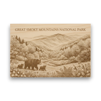 Wooden plaque with engraved landscape of Great Smoky Mountains National Park featuring bears and mountains.