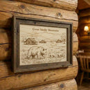 Framed artwork of bears in the Great Smoky Mountains on a wooden wall.