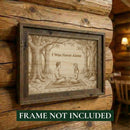 Wooden plaque with engraved couple in a forest scene and 'I Was Never Alone' text, mounted on a wooden wall.