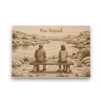 Engraved wooden plaque with a couple sitting on a bench by a lake, text 'You Stayed' above them.