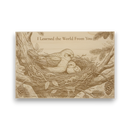 Wooden plaque with engraved image of a bird and baby bird in a nest, surrounded by branches and leaves.