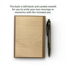 Wooden plaque with a pen on a white background