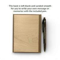 Wooden plaque with a pen on a white background