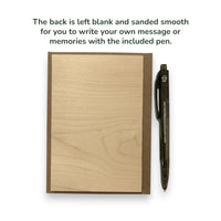 Wooden plaque with a pen on a white background