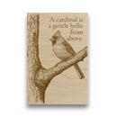 Wooden plaque with a cardinal illustration and text on a white background