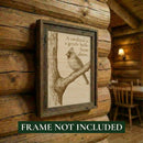 Framed artwork of a cardinal on a branch with a quote, mounted on a wooden wall.