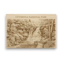Wooden plaque with engraved image of Cuyahoga National Park and text.