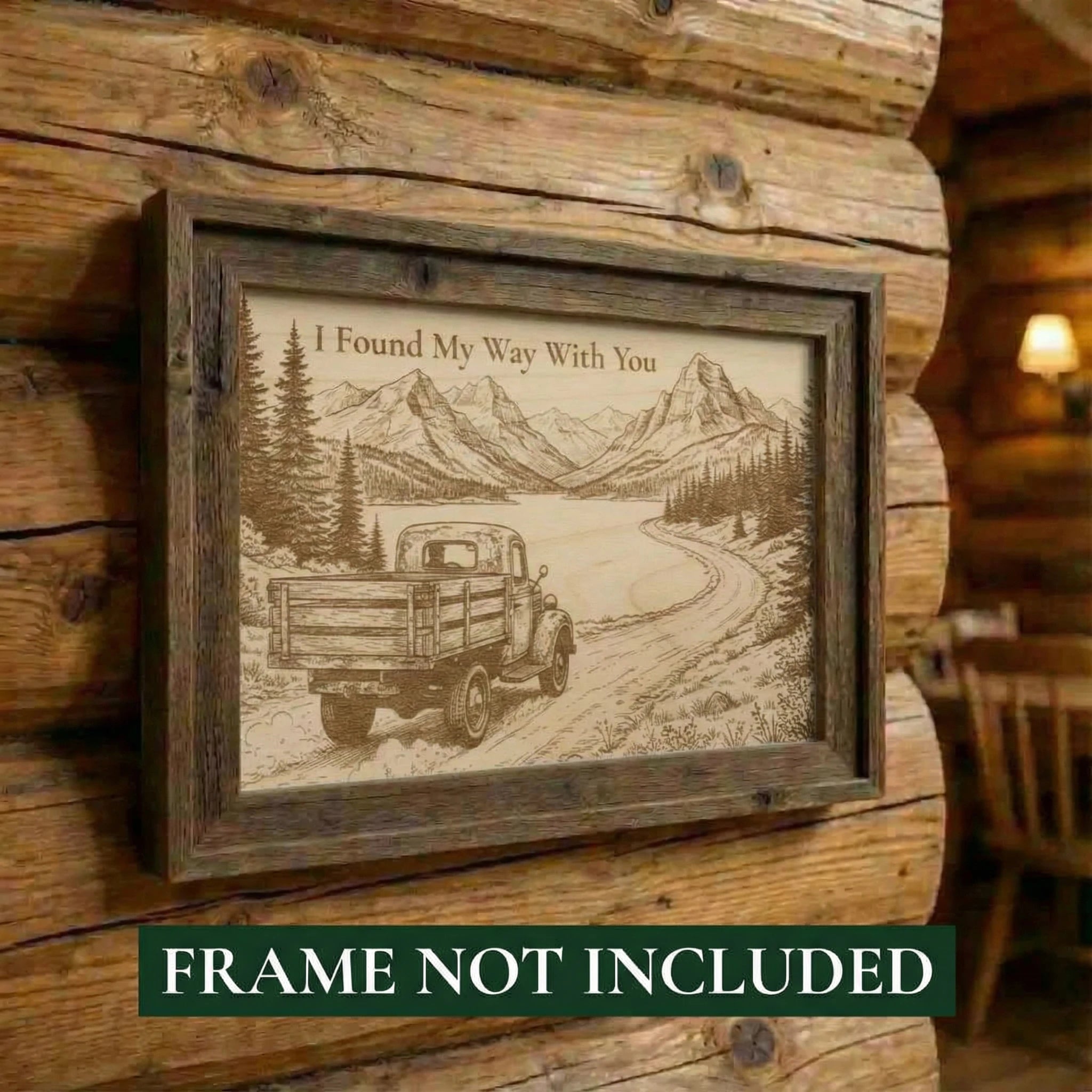 Framed artwork with a truck and mountain scene on a wooden wall, with text 'I Found My Way With You'.