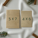Two wooden boards with dimensions '5x7' and '4x6' on a white surface with decorative elements.