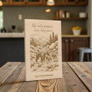 Wooden plaque with bear illustration and text on a wooden table in a kitchen setting