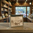 Yellowstone National Park-themed product on a wooden table with a blurred indoor background